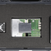 KRC-6000 evaluation carrier for KRM-6 RFSoC FPGA, heat sink, and power supply, packaged in foam-lined shipping case