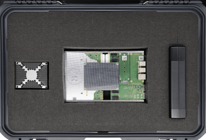 KRC-6000 evaluation carrier for KRM-6 RFSoC FPGA, heat sink, and power supply, packaged in foam-lined shipping case